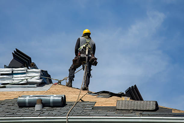Professional Gutter Installation technician working in Alma, KS